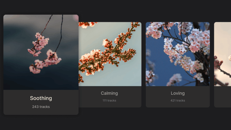 A horizontal row of image cards where one enlarges slightly on focus, demonstrating a common TV UI technique where focused elements scale up to indicate selection, especially when using image-only content.